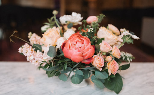 Brightly colored floral arrangement at wedding reception